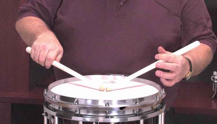 marching snare drum with sticks